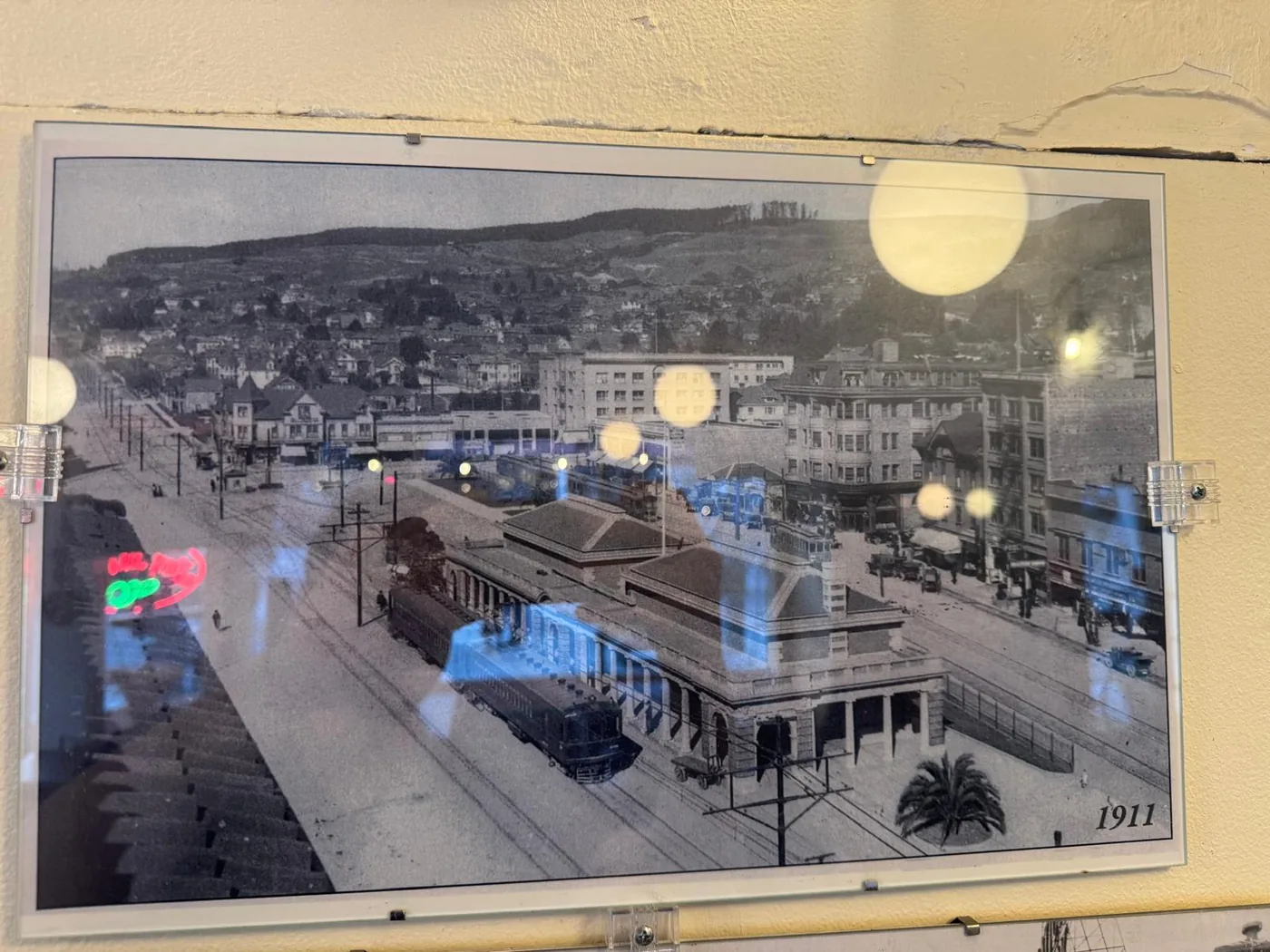 Black and white photograph of Shattuck Avenue in 1911, framed on the restaurant's wall